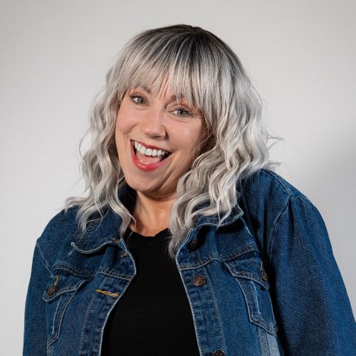 Magen King_2 Headshot of comedian magen king looking at the camera